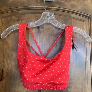 Onzie red polka dotted sports bra